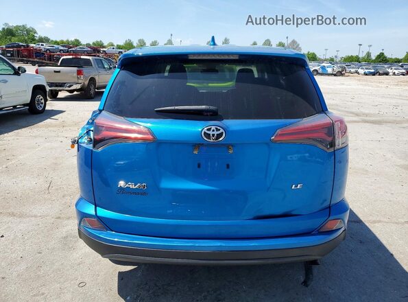 2T3ZFREV4JW508872 2018 TOYOTA RAV4 Blue Rear view