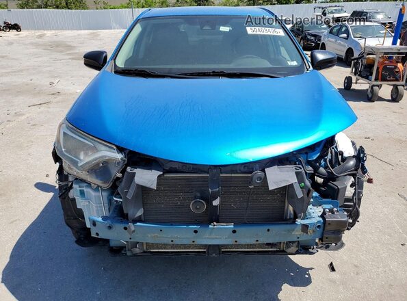 2T3ZFREV4JW508872 2018 TOYOTA RAV4 Blue Front view