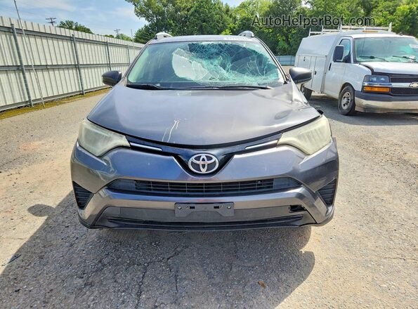 2T3ZFREV5GW235059 2016 TOYOTA RAV4 Gray Widok z przodu