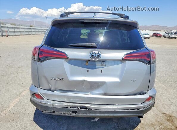 2T3ZFREV5HW402036 2017 TOYOTA RAV4 Silver Հետևի տեսք