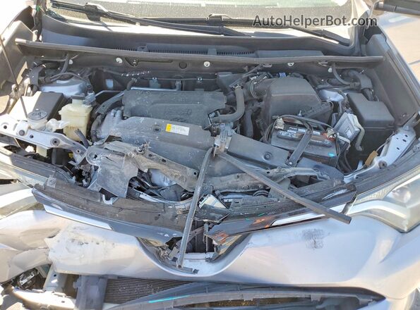 2T3ZFREV5HW402036 2017 TOYOTA RAV4 Silver Սալոնի հետևի տեսք