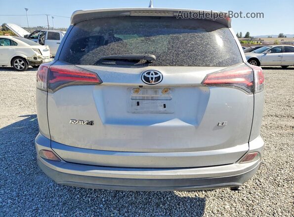 2T3ZFREV5JW494500 2018 TOYOTA RAV4 Silver Вид ззаду