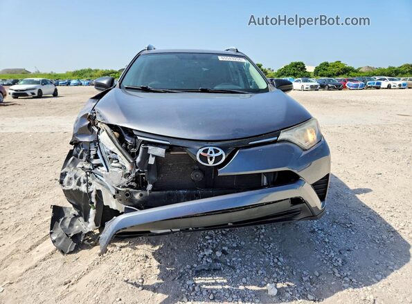 2T3ZFREV6GW240139 2016 TOYOTA RAV4 Gray Front view