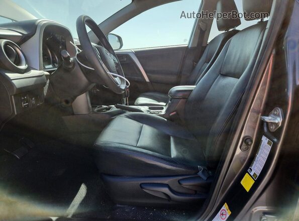 2T3ZFREV6GW240139 2016 TOYOTA RAV4 Gray Front interior view