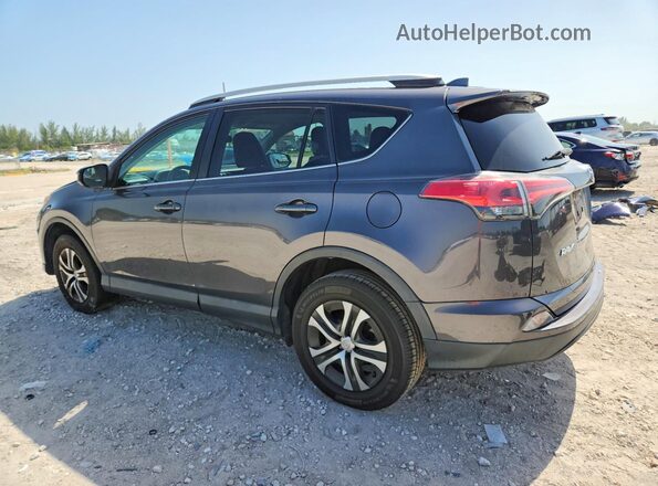 2T3ZFREV6GW240139 2016 TOYOTA RAV4 Gray Rear left
