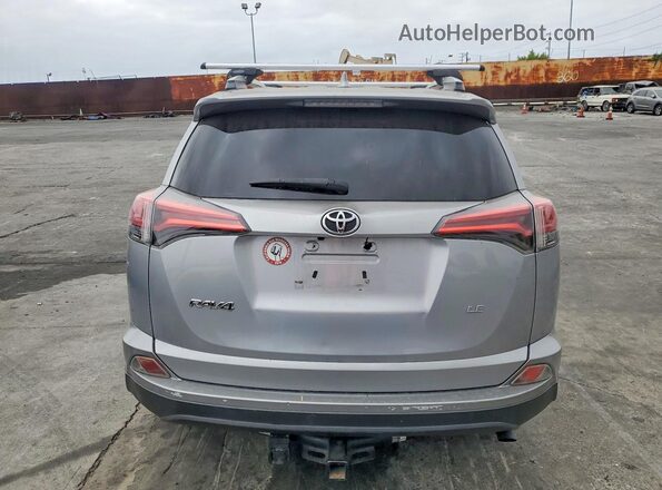2T3ZFREV6GW245423 2016 TOYOTA RAV4 Gray უკანა ხედი