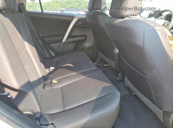 2T3ZFREV6GW258348 2016 TOYOTA RAV4 White Rear interior view
