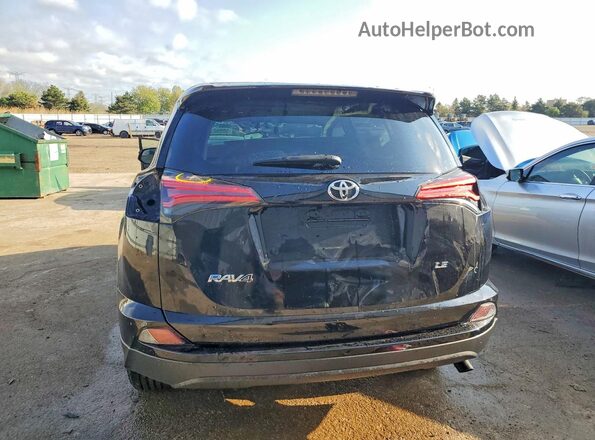 2T3ZFREV6GW281614 2016 TOYOTA RAV4 Black Հետևի տեսք