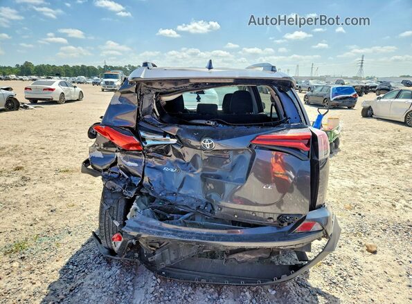 2T3ZFREV6HW348570 2017 TOYOTA RAV4 Gray Rear view