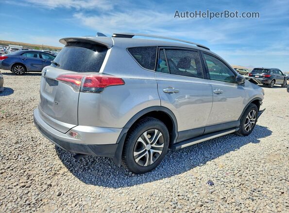 2T3ZFREV7GW262005 2016 TOYOTA RAV4 Silver Rear right