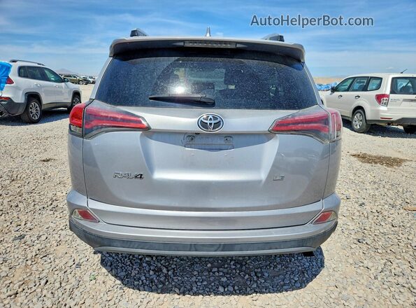 2T3ZFREV7GW262005 2016 TOYOTA RAV4 Silver Rear view