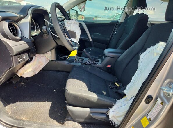 2T3ZFREV7GW262005 2016 TOYOTA RAV4 Silver Front interior view