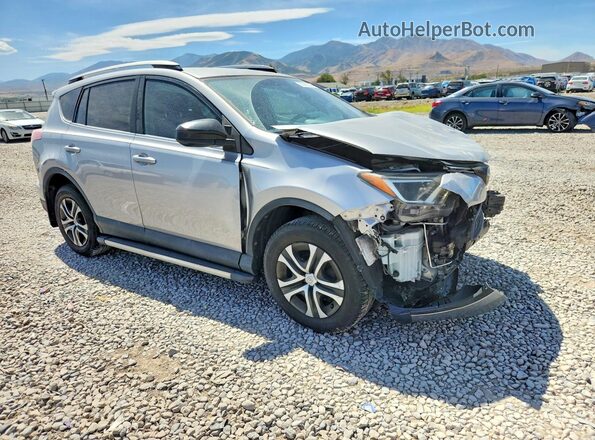 2T3ZFREV7GW262005 2016 TOYOTA RAV4 Silver Front right