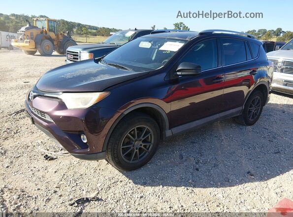 2T3ZFREV7GW278656 2016 TOYOTA RAV4 Black Առջևի ձախ երեք քառորդ տեսարան