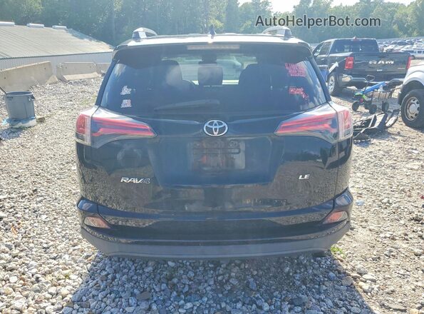 2T3ZFREV7HW344303 2017 TOYOTA RAV4 Black Вид ззаду