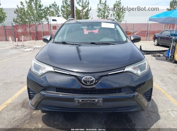 2T3ZFREV7JW420222 2018 TOYOTA RAV4 Черный Вид задней части салона