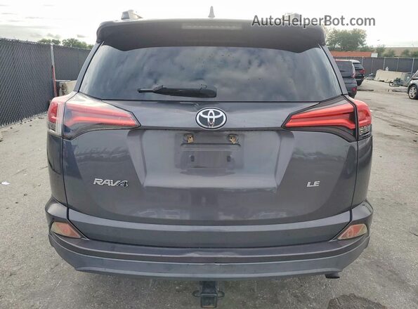 2T3ZFREV8GW256939 2016 TOYOTA RAV4 Gray Rear view