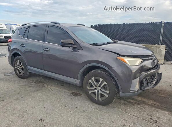 2T3ZFREV8GW256939 2016 TOYOTA RAV4 Gray Front right