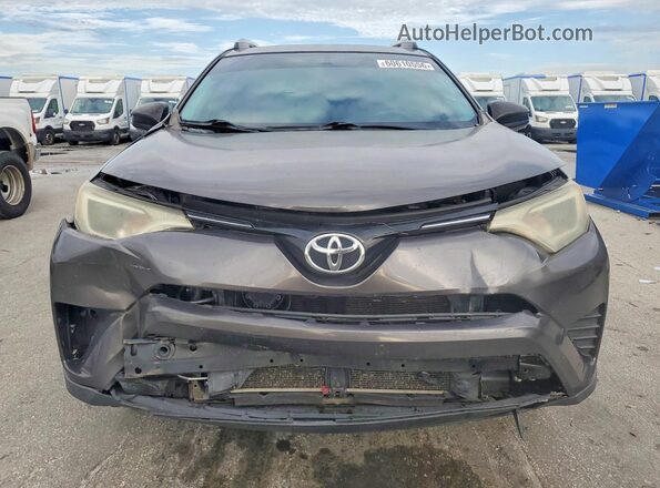 2T3ZFREV8GW256939 2016 TOYOTA RAV4 Gray Front view