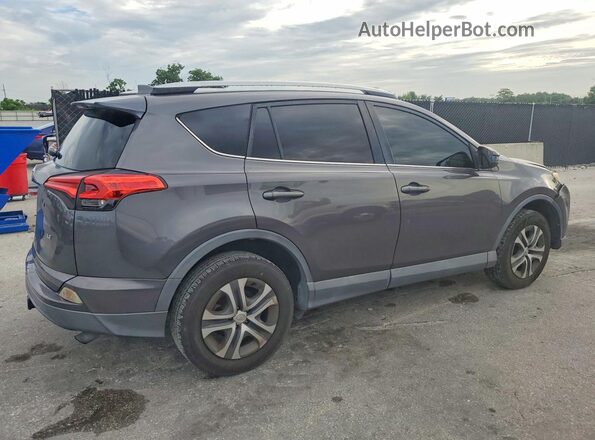 2T3ZFREV8GW256939 2016 TOYOTA RAV4 Gray Rear right