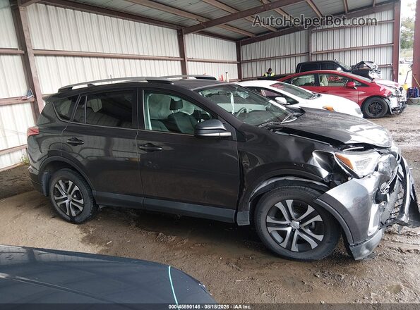 2T3ZFREV9GW274673 2016 TOYOTA RAV4 Gray Widok wnętrza z tyłu