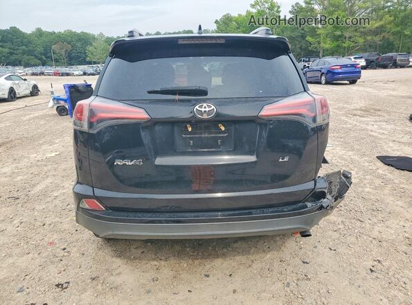 2T3ZFREV9HW330595 2017 TOYOTA RAV4 Black Вид ззаду
