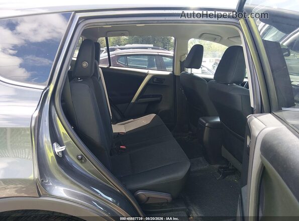 2T3ZFREV9JW457577 2018 TOYOTA RAV4 Gray VIN კოდის სტიკერის ხედი