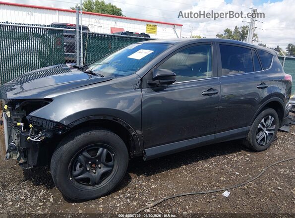 2T3ZFREV9JW457577 2018 TOYOTA RAV4 Gray 