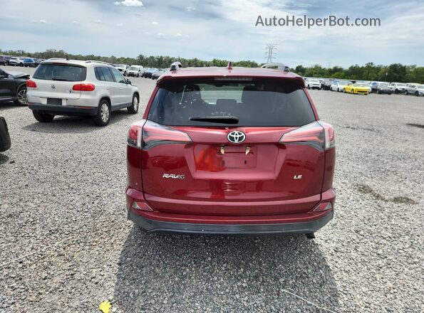 2T3ZFREV9JW458387 2018 TOYOTA RAV4 Red Rear view
