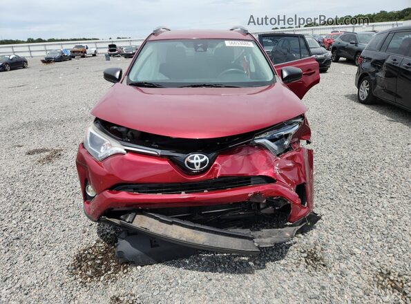 2T3ZFREV9JW458387 2018 TOYOTA RAV4 Red Front view