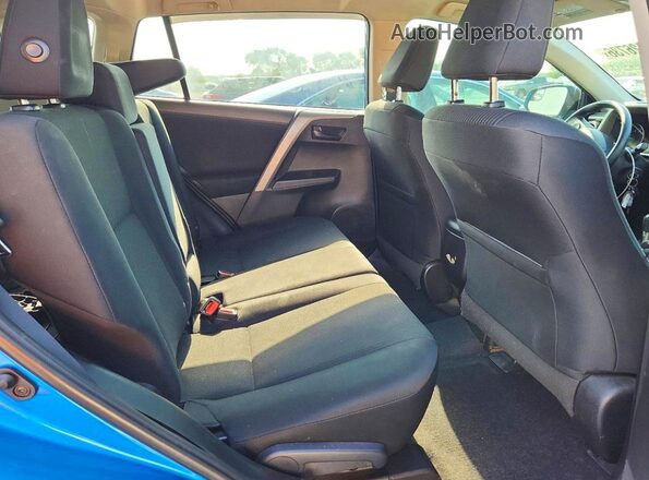 2T3ZFREVXHW369969 2017 TOYOTA RAV4 Blue Vista interior trasera