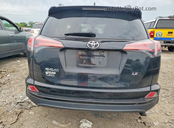 2T3ZFREVXHW380468 2017 TOYOTA RAV4 Black Rear view