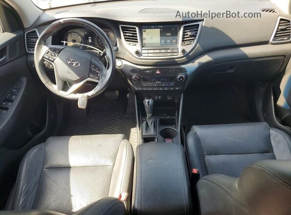 KM8J3CA24GU123571 2016 HYUNDAI TUCSON Black ხელსაწყოთა პანელის ხედი