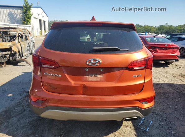 5XYZT3LBXHG405902 2017 HYUNDAI SANTA FE Orange Вид салону спереду