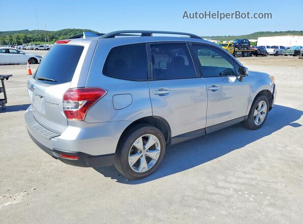 JF2SJADCXGH548889 2016 SUBARU FORESTER Silver Front right