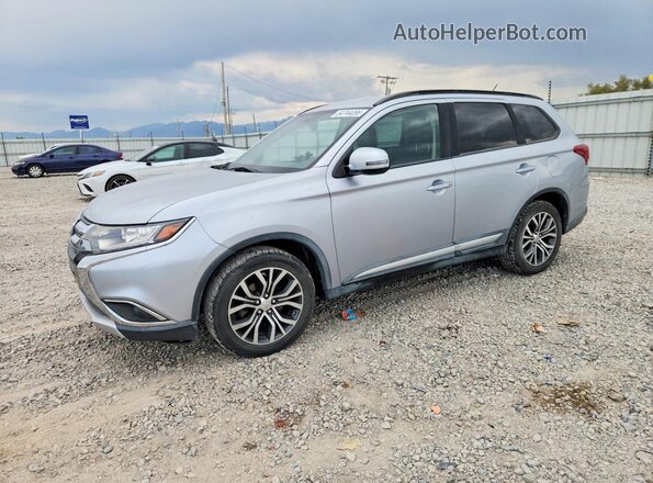 JA4AZ3A32GZ064996 2016 MITSUBISHI OUTLANDER Silver Trasero izquierdo