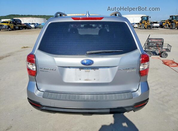 JF2SJADCXGH548889 2016 SUBARU FORESTER Silver Front interior view