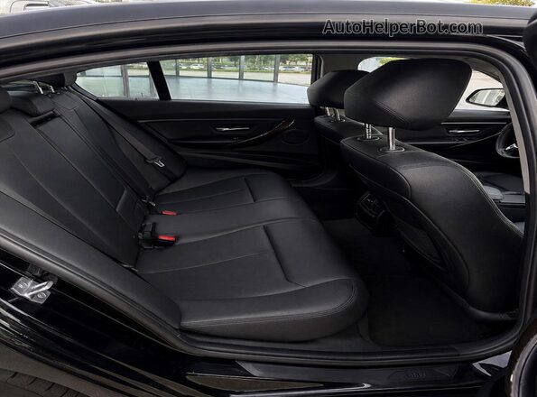 WBA8E1G51GNT34317 2016 BMW 3 SERIES Black Front interior view