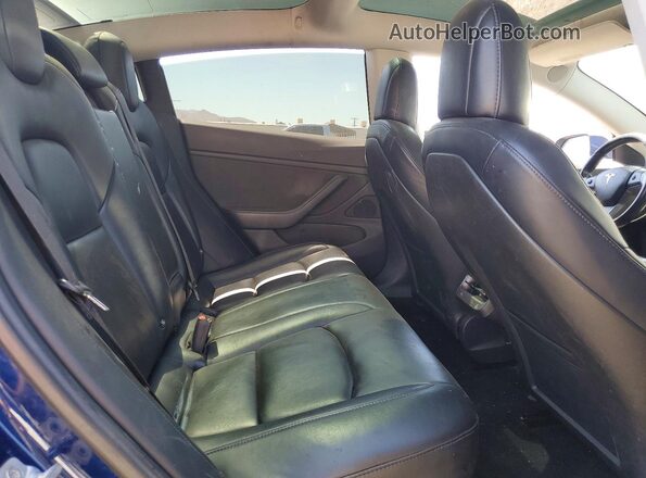 5YJ3E1EA1JF033386 2018 TESLA MODEL Blue Rear interior view