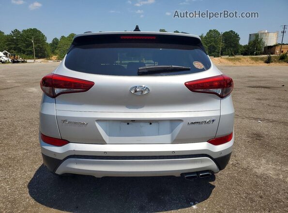 KM8J33A23HU276668 2017 HYUNDAI TUCSON Silver Vista interior delantera