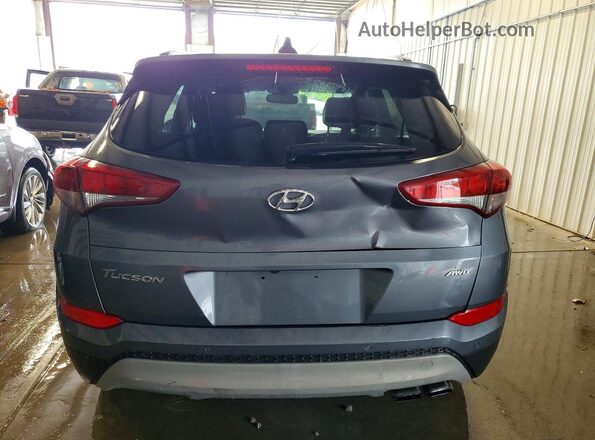 KM8J3CA22JU690014 2018 HYUNDAI TUCSON Gray Вид салону спереду