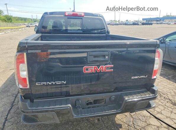 1GTG6EEN6H1191976 2017 GMC CANYON Black Widok wnętrza z przodu
