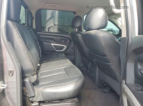 1N6BA1F24HN509508 2017 NISSAN TITAN Gray Vista interior trasera