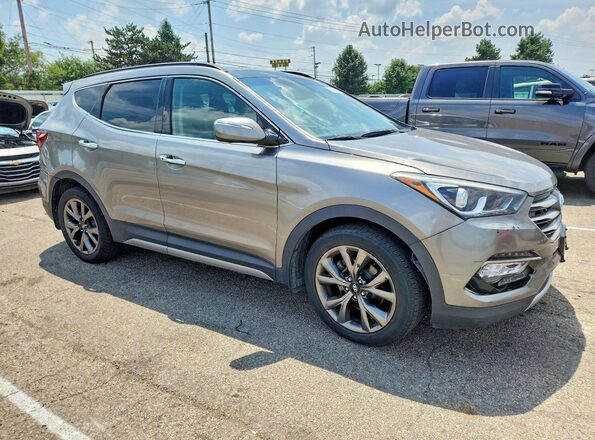 5XYZWDLA5JG506873 2018 HYUNDAI SANTA FE Gray Front view
