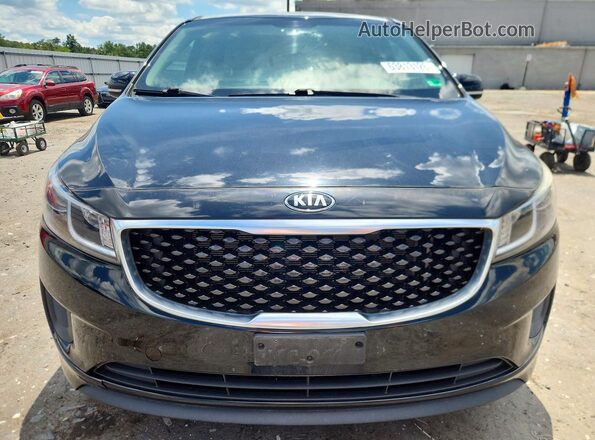 KNDMB5C19H6306877 2017 KIA SEDONA Черный Вид сзади