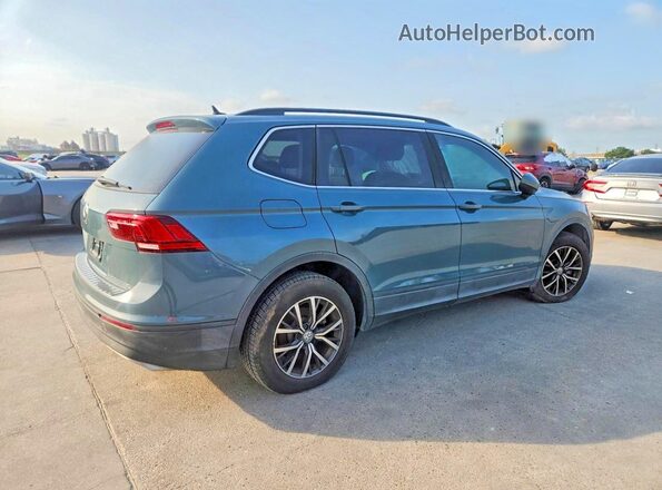 3VV3B7AXXKM104721 2019 VOLKSWAGEN TIGUAN Зеленый Передняя правая четверть