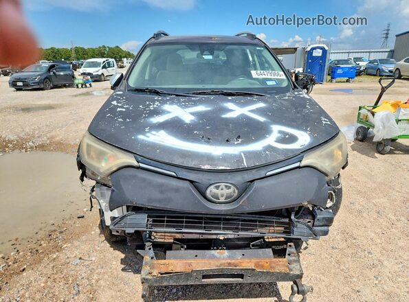 2T3RFREV3HW613770 2017 TOYOTA RAV4 Black Rear view