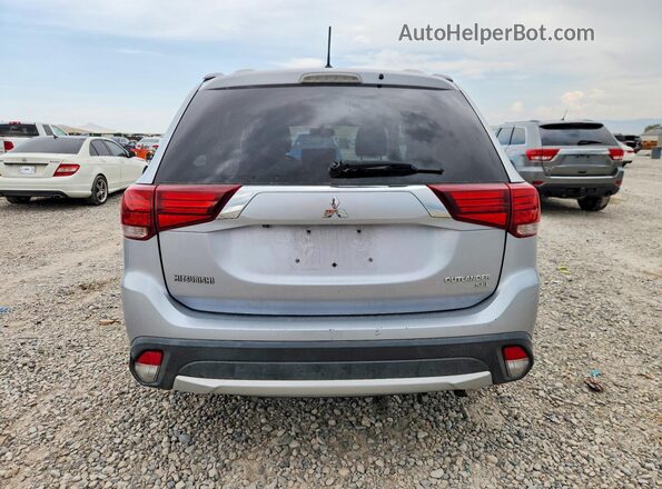 JA4AZ3A32GZ064996 2016 MITSUBISHI OUTLANDER Silver Vista interior delantera