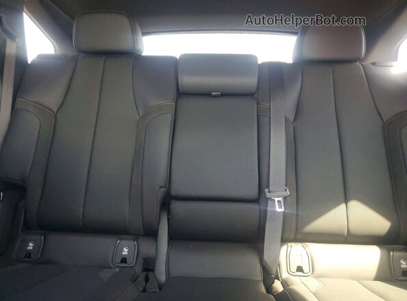 4W5KHNRL0RZ504944 2024 ACURA ZDX Silver Widok wnętrza z tyłu