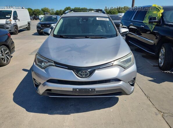 2T3DFREV5GW495035 2016 TOYOTA RAV4 Silver Widok z tyłu